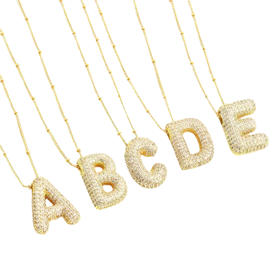Buchstaben-Anhänger Set | Gold