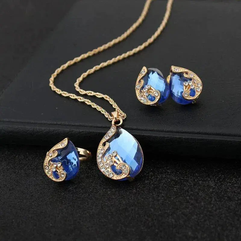 Blaue Kristall-Halskette + Ohrringe-Set aus blauem Kristall in Gold