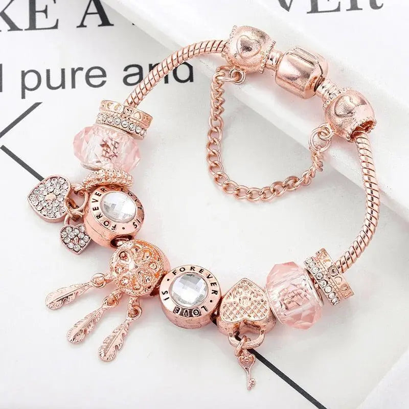 Rosé Traumfänger-Armband mit Charms aus Sterlingsilber enthalten
