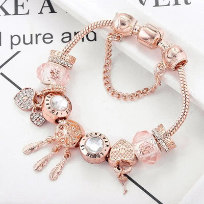 Rosé Traumfänger-Armband mit Charms aus Sterlingsilber enthalten