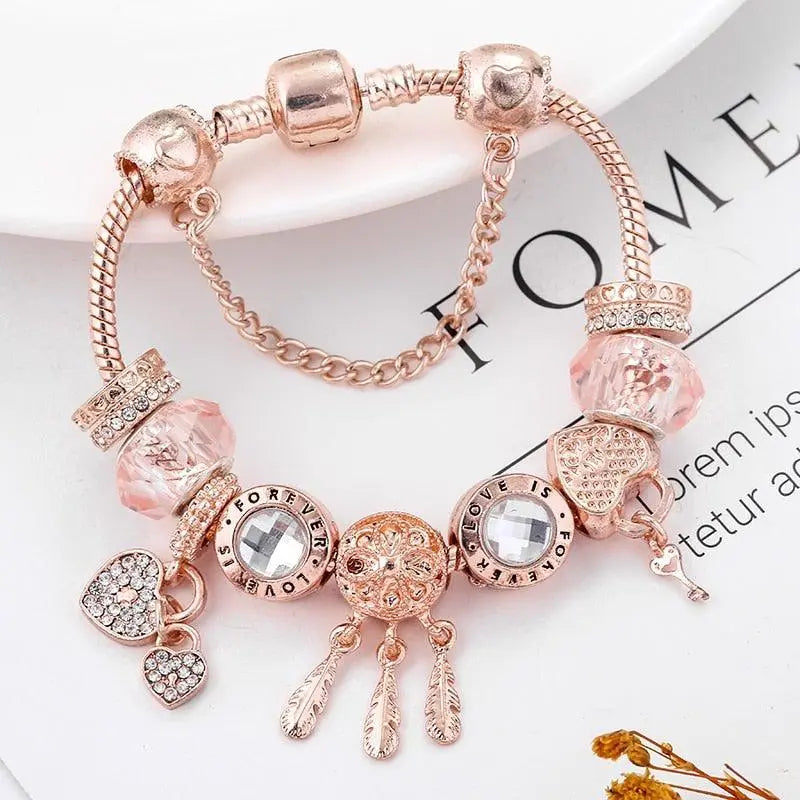 Rosé Traumfänger-Armband mit Charms aus Sterlingsilber enthalten