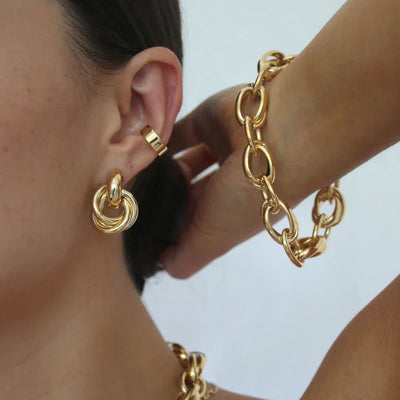 Aussage Interlocking Ohrringe | Gold