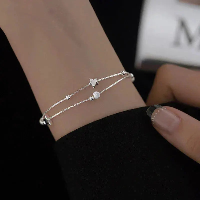 Silberarmband mit Sternen
