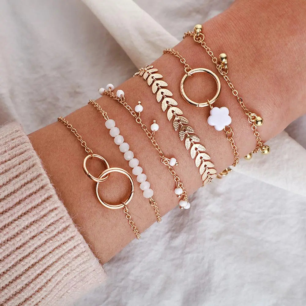 Pack von Boho-Armbändern in Gold