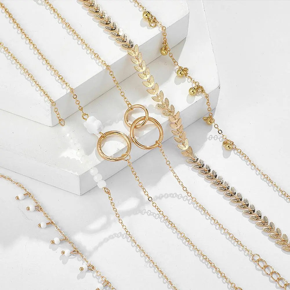 Pack von Boho-Armbändern in Gold