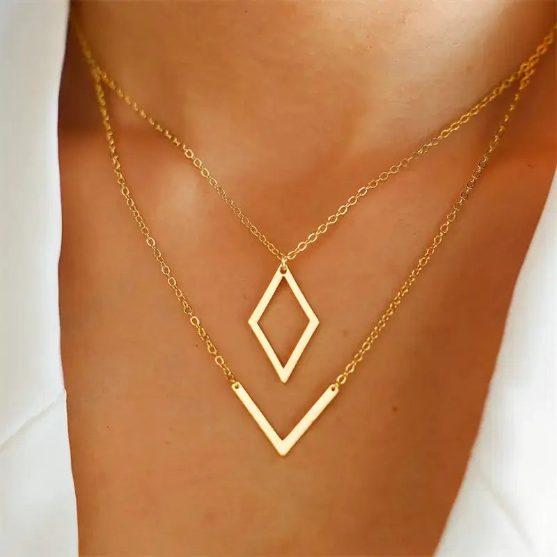 Elegante V-förmige geometrische Anhänger-Halskette