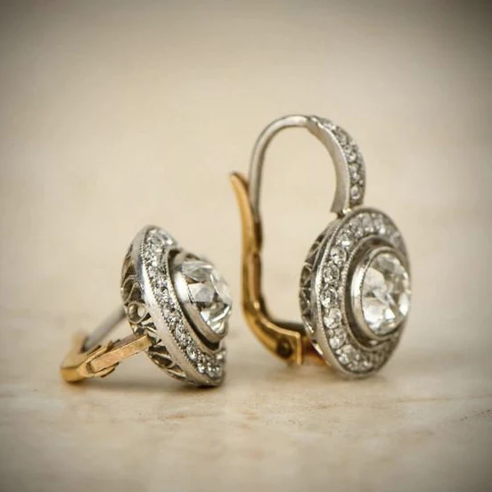 Vintage Gold- und Silberohrringe mit Kristallen